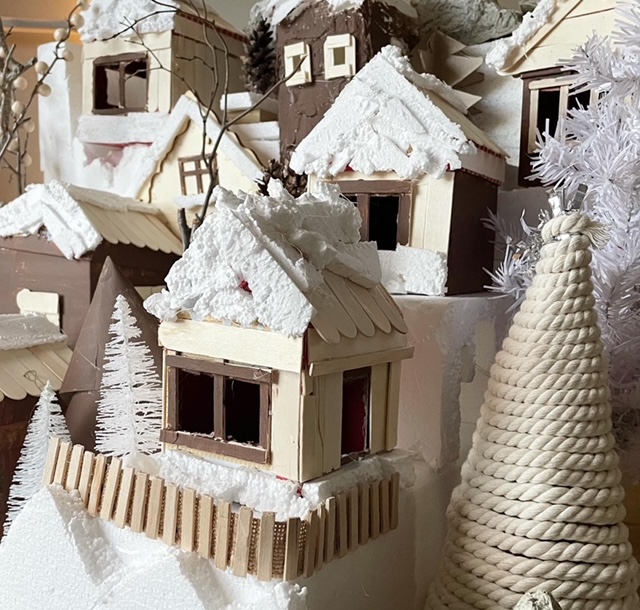 Christmas village close up of DIY houses made of boxes